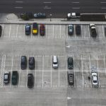 aerial view of cars parked on parking lot