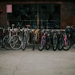 pile of assorted-color bikes on concrete pavemenet